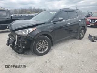 ✅ 2018 Hyundai Santa Fe 2.4L • VIN: 5XYZUDLB4JG563810 • Лот: 77243283. Опубликован ранее на Copart с пробегом 70 150 миль. Бесплатный доступ к архиву аукционных продаж из США и подробный отчёт об истории автомобиля на DreamBid. Изображение 1.