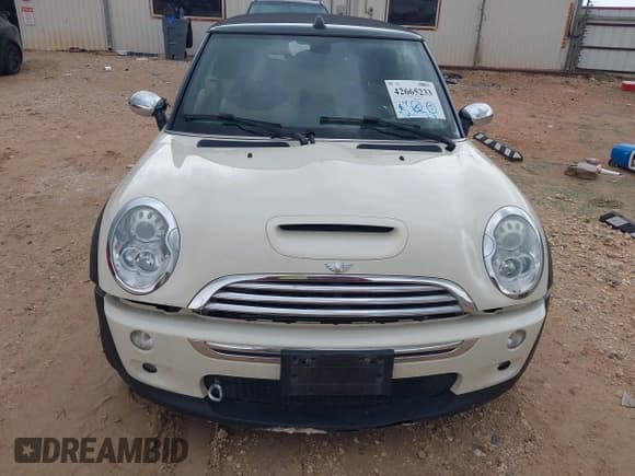 ✅ 2007 MINI Convertible S • VIN: WMWRH33597TL95200 • Lot: 42665233. Listed on IAAI with 76,917 mi. Free auction sales archive from the USA and detailed vehicle history report at DreamBid. Image 6.