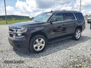 2015 Chevrolet Tahoe LS with VIN 1GNSCAKC8FR733373, listed as a Copart auction lot 68617295 with 157,118 mi miles and Clean title. Bid and sale history available at DreamBid. Image 1.