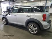 ✅ 2013 MINI Countryman S • VIN: WMWZC3C51DWP22214 • Lot: 93966435. Listed on Copart with 125,664 mi. Free auction sales archive from the USA and detailed vehicle history report at DreamBid. Image 2.