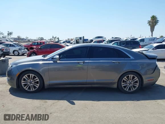 ✅ 2014 Lincoln MKZ Hybrid • VIN: 3LN6L2LU0ER818309 • Лот: 43076770. Опубликован ранее на IAAI с пробегом 213 262 миль. Бесплатный доступ к архиву аукционных продаж из США и подробный отчёт об истории автомобиля на DreamBid. Изображение 14.