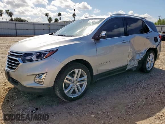 ✅ 2021 Chevrolet Equinox Premier • VIN: 3GNAXNEV5MS163637 • Lot: 70869815. Wystawiony na Copart z przebiegiem 32 337 mil. Bezpłatny archiwum sprzedaży aukcyjnych z USA i szczegółowy raport historii pojazdu na DreamBid. Zdjęcie 1.