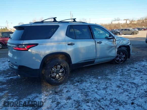 ✅ 2020 Chevrolet Traverse Premier • VIN: 1GNEVKKW0LJ296745 • Lot: 41284830. Listed on IAAI with 76,373 mi. Free auction sales archive from the USA and detailed vehicle history report at DreamBid. Image 4.