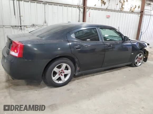 2009 Dodge Charger SXT с VIN 2B3KA33V89H627232, выставлен на аукционе Copart как лот 80537144 с пробегом 259 502 миль миль и Списание • Salvage title. История ставок и продаж доступна на DreamBid. Изображение 3.