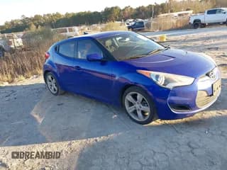✅ 2014 Hyundai Veloster • VIN: KMHTC6AD7EU199939 • Lot: 41289277. Wystawiony na IAAI z przebiegiem 192 798 mil. Bezpłatny archiwum sprzedaży aukcyjnych z USA i szczegółowy raport historii pojazdu na DreamBid. Zdjęcie 1.
