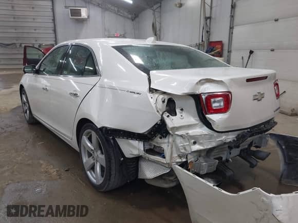 2013 Chevrolet Malibu LTZ with VIN 1G11J5SX2DF190629, listed as a IAAI auction lot 42402298 with 69,042 mi miles and . Bid and sale history available at DreamBid. Image 3.