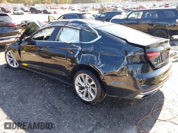 ✅ 2022 Audi A5 Sportback Premium Plus • VIN: WAUCBCF58NA034102 • Lot: 43585859. Listed on IAAI with 51,962 mi. Free auction sales archive from the USA and detailed vehicle history report at DreamBid. Image 3.