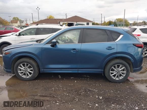 ✅ 2024 Mazda CX-5 S Select • VIN: JM3KFBBM4R0416074 • Lot: 43580974. Wystawiony na IAAI z przebiegiem 42 042 mil. Bezpłatny archiwum sprzedaży aukcyjnych z USA i szczegółowy raport historii pojazdu na DreamBid. Zdjęcie 14.