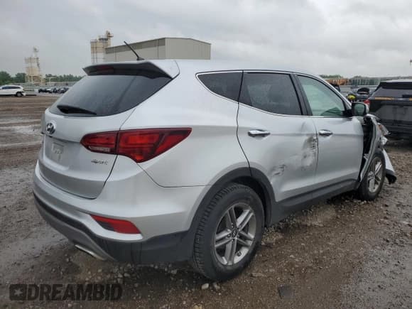 ✅ 2018 Hyundai Santa Fe 2.4L • VIN: 5XYZT3LB9JG569177 • Лот: 52165343. Опубликован ранее на Copart с пробегом Не указан. Бесплатный доступ к архиву аукционных продаж из США и подробный отчёт об истории автомобиля на DreamBid. Изображение 3.