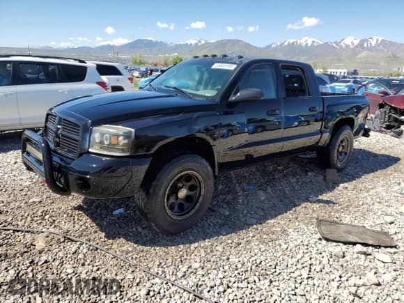 2005 Dodge Dakota ST with VIN 1D7HW28K55S259104, listed as a Copart auction lot 55859185 with 143,004 mi miles and Salvage title. Bid and sale history available at DreamBid. Image 1.