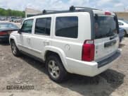 ✅ 2010 Jeep Commander Sport • VIN: 1J4RG4GK7AC127808 • Lot: 42479312. Listed on IAAI with 161,385 mi. Free auction sales archive from the USA and detailed vehicle history report at DreamBid. Image 3.