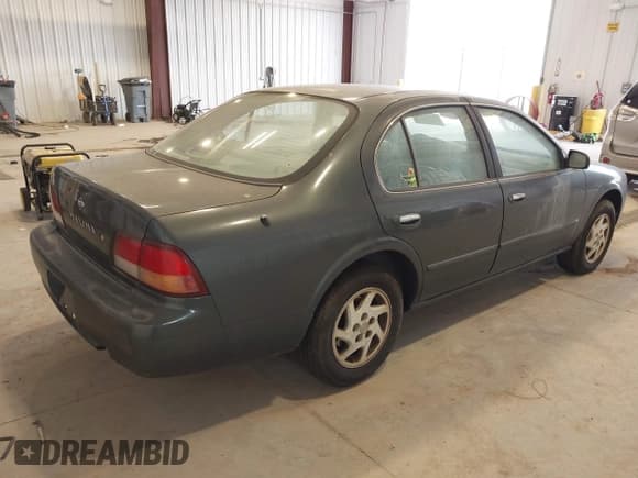 ✅ 1997 Nissan Maxima GXE • VIN: JN1CA21D3VT852052 • Lot: 42811019. Listed on IAAI with 172,430 mi. Free auction sales archive from the USA and detailed vehicle history report at DreamBid. Image 4.
