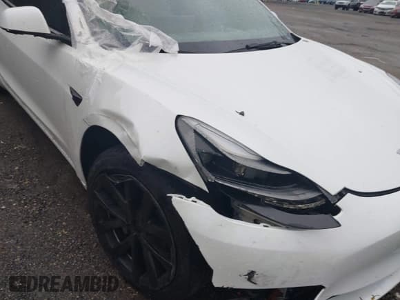 ✅ 2022 Tesla Model 3 • VIN: 5YJ3E1EAXNF349567 • Lot: 43303787. Wystawiony na IAAI z przebiegiem Nie podano. Bezpłatny archiwum sprzedaży aukcyjnych z USA i szczegółowy raport historii pojazdu na DreamBid. Zdjęcie 6.