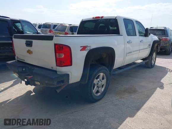 ✅ 2014 Chevrolet Silverado 2500HD LT • VIN: 1GC1KXCG1EF131636 • Lot: 43112265. Listed on IAAI with 309,813 mi. Free auction sales archive from the USA and detailed vehicle history report at DreamBid. Image 4.
