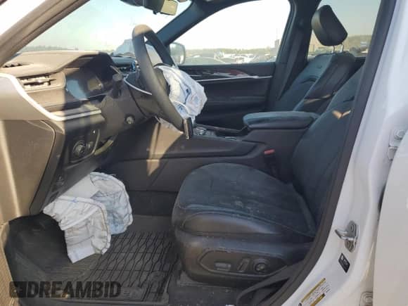 2022 Jeep Grand Cherokee Trailhawk with VIN 1C4RJYC63N8747507, listed as a Copart auction lot 76771914 with 18,057 mi miles and Salvage title. Bid and sale history available at DreamBid. Image 7.