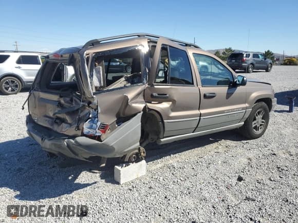 ✅ 2002 Jeep Grand Cherokee Laredo • VIN: 1J4GW48S52C232227 • Lot: 85100645. Listed on Copart with 128,563 mi. Free auction sales archive from the USA and detailed vehicle history report at DreamBid. Image 3.