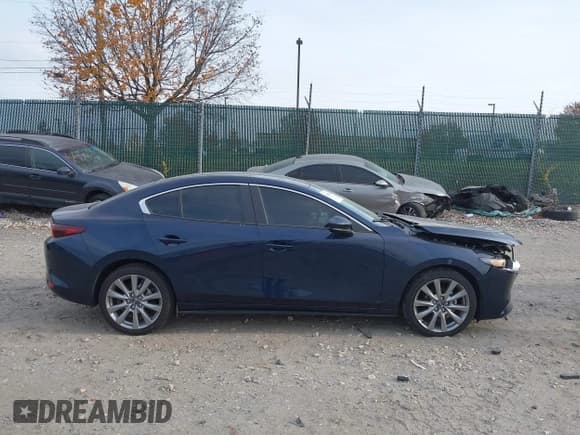 ✅ 2022 Mazda 3 Select • VIN: 3MZBPABL3NM309450 • Lot: 43650319. Listed on IAAI with 32,846 mi. Free auction sales archive from the USA and detailed vehicle history report at DreamBid. Image 13.