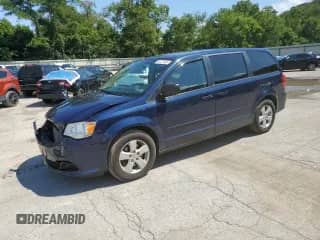 2013 Dodge Grand Caravan SXT with VIN 2C4RDGBG9DR562585, listed as a Copart auction lot 66472605 with 138,584 mi miles and Salvage title. Bid and sale history available at DreamBid. Image 1.