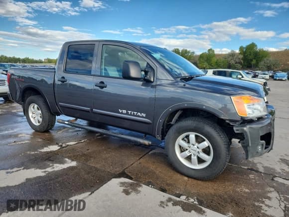 ✅ 2012 Nissan Titan SL • VIN: 1N6BA0EC8CN303038 • Lot: 84636465. Listed on Copart with 128,422 mi. Free auction sales archive from the USA and detailed vehicle history report at DreamBid. Image 4.