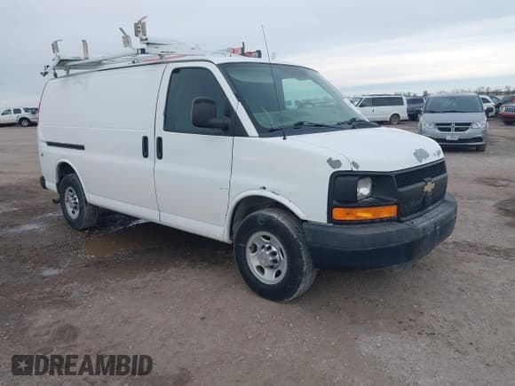 ✅ 2013 Chevrolet Express Cargo • VIN: 1GCWGFCAXD1140635 • Lot: 43410975. Listed on IAAI with 185,343 mi. Free auction sales archive from the USA and detailed vehicle history report at DreamBid. Image 1.