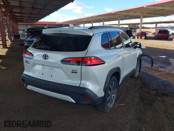 ✅ 2022 Toyota Corolla Cross XLE • VIN: 7MUDAAAG3NV014484 • Lot: 43761950. Listed on IAAI with 34,507 mi. Free auction sales archive from the USA and detailed vehicle history report at DreamBid. Image 4.