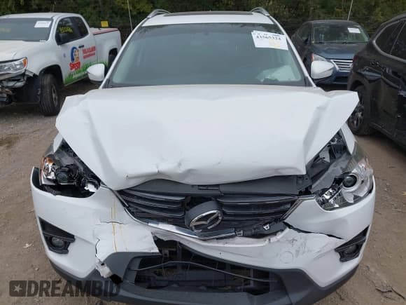 ✅ 2016 Mazda CX-5 Grand Touring • VIN: JM3KE4DY6G0873688 • Lot: 43565324. Wystawiony na IAAI z przebiegiem 80 920 mil. Bezpłatny archiwum sprzedaży aukcyjnych z USA i szczegółowy raport historii pojazdu na DreamBid. Zdjęcie 12.