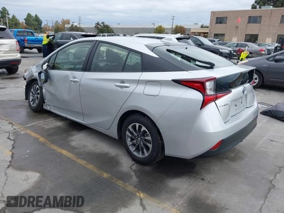 ✅ 2022 Toyota Prius LE • VIN: JTDKAMFUXN3189351 • Lot: 43675769. Listed on IAAI with 42,666 mi. Free auction sales archive from the USA and detailed vehicle history report at DreamBid. Image 3.