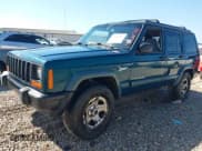 ✅ 1998 Jeep Cherokee Sport • VIN: 1J4FJ68S1WL215548 • Lot: 43104546. Listed on IAAI with 236,330 mi. Free auction sales archive from the USA and detailed vehicle history report at DreamBid. Image 2.