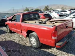 1998 Dodge Dakota SLT с VIN 1B7GL22X4WS679330, выставлен на аукционе Copart как лот 73655614 с пробегом Не указан миль и Списание • Salvage title. История ставок и продаж доступна на DreamBid. Изображение 2.