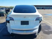 ✅ 2023 Tesla Model Y Long Range • VIN: 7SAYGDEE0PF945202 • Lot: 41611762. Listed on IAAI with 7,316 mi. Free auction sales archive from the USA and detailed vehicle history report at DreamBid. Image 16.