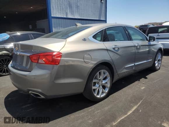 2019 Chevrolet Impala Premier z VIN 1G1105S35KU126237, wystawiony jako Copart lot #61374535 z przebiegiem 103 873 mil mil oraz Szkoda całkowita • Salvage title. Historia ofert i sprzedaży dostępna na DreamBid. Obrazek 3.