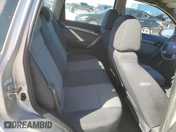 ✅ 2009 Chevrolet Aveo 1LT • VIN: KL1TD66E49B306599 • Lot: 48330275. Wystawiony na Copart z przebiegiem 59 484 mil. Bezpłatny archiwum sprzedaży aukcyjnych z USA i szczegółowy raport historii pojazdu na DreamBid. Zdjęcie 10.