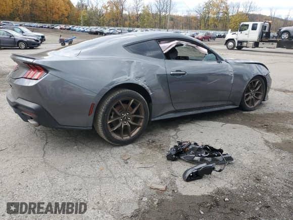 ✅ 2024 Ford Mustang EcoBoost • VIN: 1FA6P8THXR5121873 • Lot: 82576775. Listed on Copart with 23,598 mi. Free auction sales archive from the USA and detailed vehicle history report at DreamBid. Image 3.