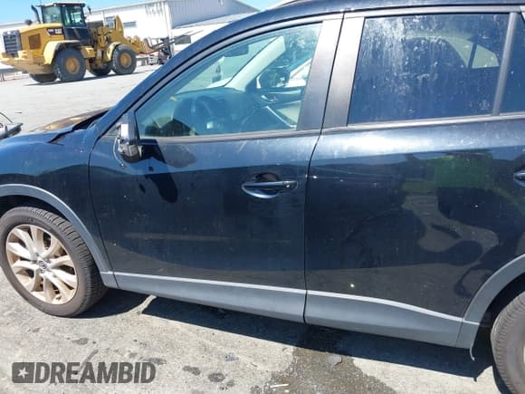 ✅ 2014 Mazda CX-5 Grand Touring • VIN: JM3KE2DY3E0339601 • Lot: 42652114. Wystawiony na IAAI z przebiegiem 153 063 mil. Bezpłatny archiwum sprzedaży aukcyjnych z USA i szczegółowy raport historii pojazdu na DreamBid. Zdjęcie 14.