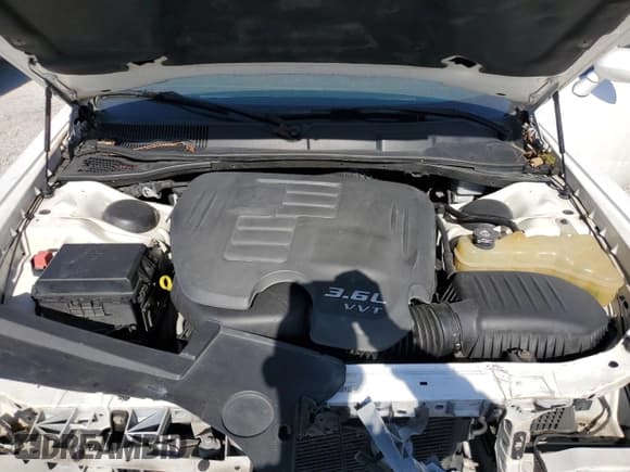 ✅ 2012 Dodge Challenger SXT • VIN: 2C3CDYAG4CH206728 • Lot: 74813574. Wystawiony na Copart z przebiegiem 158 848 mil. Bezpłatny archiwum sprzedaży aukcyjnych z USA i szczegółowy raport historii pojazdu na DreamBid. Zdjęcie 11.