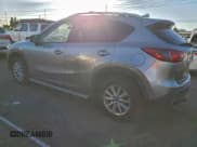 ✅ 2014 Mazda CX-5 Sport • VIN: JM3KE2BE5E0379221 • Lot: 96541255. Listed on Copart with 216,899 mi. Free auction sales archive from the USA and detailed vehicle history report at DreamBid. Image 2.