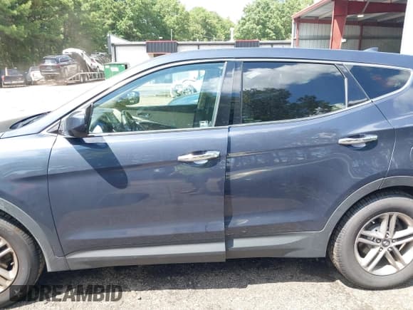 ✅ 2017 Hyundai Santa Fe 2.4L • VIN: 5XYZTDLB9HG441313 • Lot: 42742060. Listed on IAAI with 68,089 mi. Free auction sales archive from the USA and detailed vehicle history report at DreamBid. Image 14.