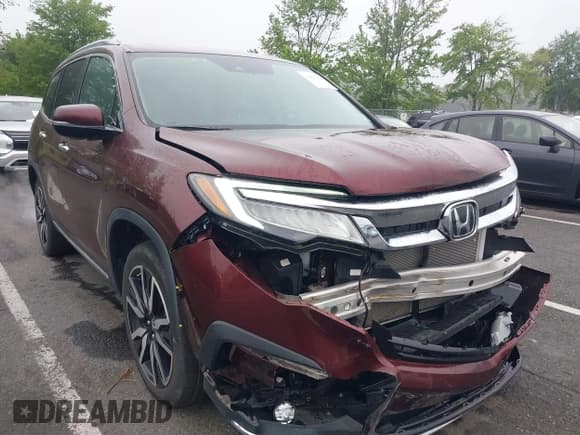 ✅ 2021 Honda Pilot Touring 8-Passenger • VIN: 5FNYF6H92MB002640 • Lot: 42433382. Listed on IAAI with 47,428 mi. Free auction sales archive from the USA and detailed vehicle history report at DreamBid. Image 17.