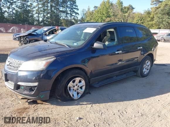 2015 Chevrolet Traverse LS z VIN 1GNKRFEDXFJ275799, wystawiony jako IAAI lot #43404084 z przebiegiem 150 564 mil mil oraz . Historia ofert i sprzedaży dostępna na DreamBid. Obrazek 2.