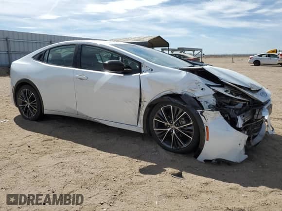 2024 Toyota Prius LE with VIN JTDACAAUXR3030010, listed as a Copart auction lot 69868615 with 22,790 mi miles and Salvage title. Bid and sale history available at DreamBid. Image 4.