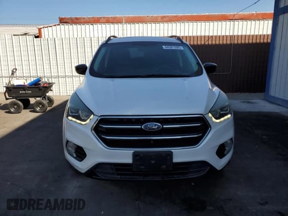 ✅ 2017 Ford Escape SE • VIN: 1FMCU9G96HUA94752 • Lot: 84301285. Listed on Copart with 95,677 mi. Free auction sales archive from the USA and detailed vehicle history report at DreamBid. Image 5.