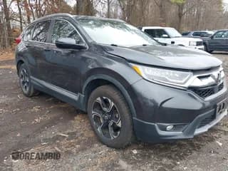 ✅ 2019 Honda CR-V Touring • VIN: 2HKRW2H99KH602129 • Lot: 43855817. Listed on IAAI with 91,135 mi. Free auction sales archive from the USA and detailed vehicle history report at DreamBid. Image 1.
