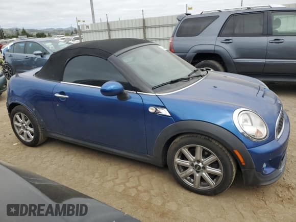 ✅ 2013 MINI Roadster S • VIN: WMWSY3C51DT593668 • Lot: 54244665. Listed on Copart with 205,177 mi. Free auction sales archive from the USA and detailed vehicle history report at DreamBid. Image 4.