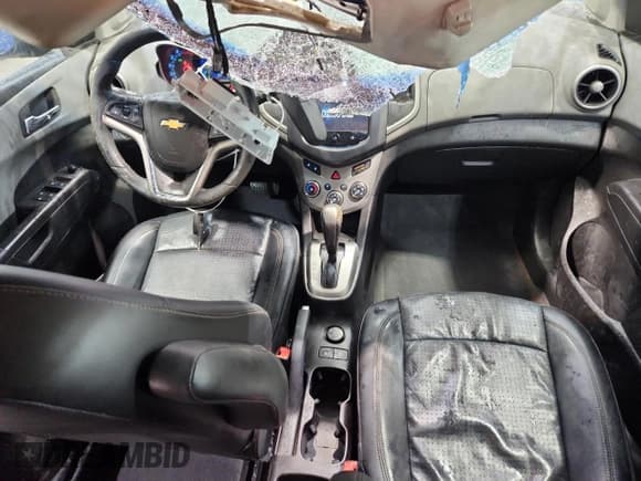 ✅ 2013 Chevrolet Sonic LTZ • VIN: 1G1JE6SB3D4211398 • Lot: 93627505. Listed on Copart with 109,453 mi. Free auction sales archive from the USA and detailed vehicle history report at DreamBid. Image 8.