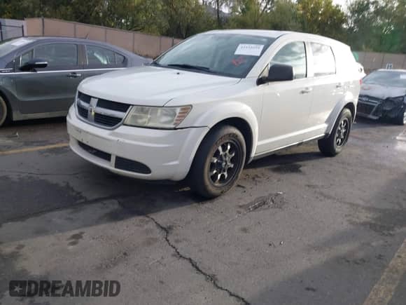 2010 Dodge Journey SE z VIN 3D4PG4FB7AT198982, wystawiony jako IAAI lot #43435599 z przebiegiem 202 565 mil mil oraz . Historia ofert i sprzedaży dostępna na DreamBid. Obrazek 17.