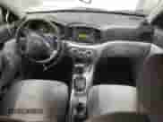 2007 Hyundai Accent GLS z VIN KMHCN46CX7U157508, wystawiony jako Copart lot #78137694 z przebiegiem 174 140 mil mil oraz Szkoda całkowita • Salvage title. Historia ofert i sprzedaży dostępna na DreamBid. Obrazek 8.