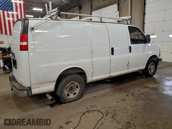 ✅ 2014 Chevrolet Express Cargo • VIN: 1GCWGFCG0E1114535 • Lot: 94756005. Listed on Copart with 343,899 mi. Free auction sales archive from the USA and detailed vehicle history report at DreamBid. Image 3.
