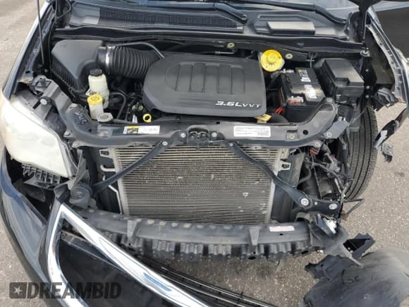 ✅ 2015 Chrysler Town & Country Touring L • VIN: 2C4RC1CG7FR526590 • Lot: 87221495. Listed on Copart with 105,598 mi. Free auction sales archive from the USA and detailed vehicle history report at DreamBid. Image 12.