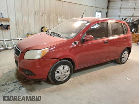 2009 Chevrolet Aveo 1LT z VIN KL1TD66E79B646149, wystawiony jako Copart lot #87581235 z przebiegiem 156 634 mil mil oraz Szkoda całkowita • Salvage title. Historia ofert i sprzedaży dostępna na DreamBid. Obrazek 1.
