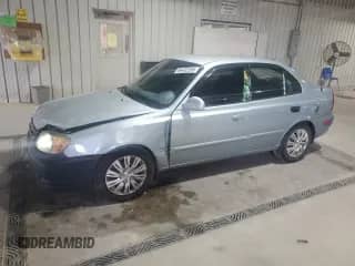 2005 Hyundai Accent GLS with VIN KMHCG45C65U662633, listed as a Copart auction lot 86432595 with 221,608 mi miles and Salvage title. Bid and sale history available at DreamBid. Image 1.